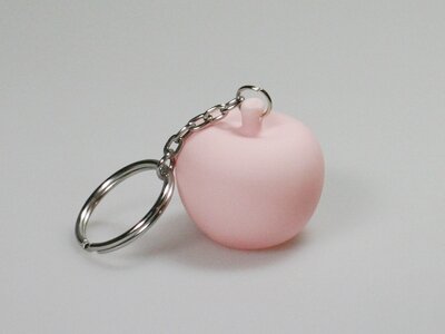 roze sleutelhanger appel pom amandine doopsuiker suikerbonen