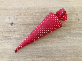 Puntzak in stof - rood met witte bol