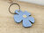 Lederlook sleutelhanger bloem - babyblauw